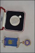 A silver hallmarked Boar club medal together with