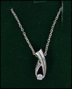 A 14ct white gold diamond pendant necklace  in the