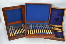 3 Edwardian cased canteens of cultery, all silver