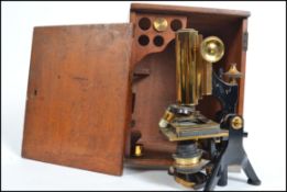 A good mid century mahogany cased scientific micro