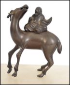 A 19th century cast bronze Chinese figurine study