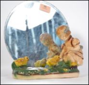 A vintage early 20th century chalk ware diorama of