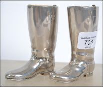 A pair of retro silver plated drinks measures in t