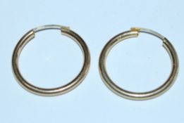 A pair of 9ct gold hoop earrings. Marked 375 Italy