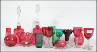 A good collection of cranberry glass dating from t