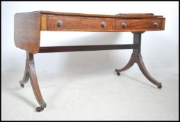 A 19th century Georgian mahogany inlaid large libr
