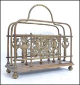 An early 20th century magazine / paper rack having