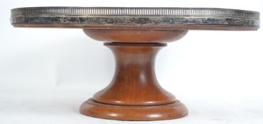 A good silver hallmarked and oak lazy susan of lar