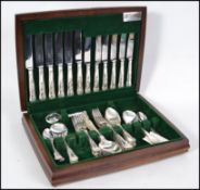A good cased canteen of cutlery in the baize lined