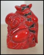A 20th century Asiatic /Chinese coral figurine of