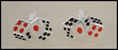 A pair of contemporary gentleman's silver cufflink