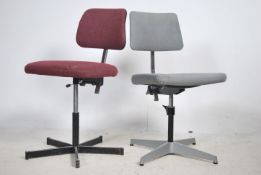 A pair of retro 1970's office clerks chairs both with original fabric upholstered seats and back