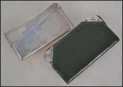 A silver hallmarked hinged card case with Birmingh