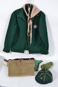 A retro 20th century Scout Masters uniform to include plus fours, jacket, neck scarfs, toggles etc.