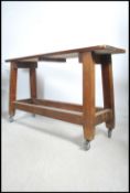 A good mid century Industrial Funeral trestle tabl