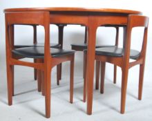 A 20th century Nathan teak round extending table w