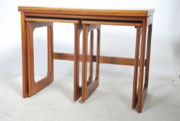 A retro teak wood nest of three Macintosh and Co s