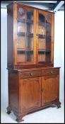 An Edwardian mahogany library bookcase cabinet hav