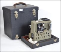 A vintage 20th century Eumig P8 Imperial projector complete in it's original carry case.