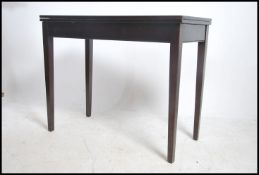 A 1950's Air Ministry mahogany games / card table