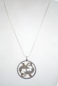 A George Tarratt hallmarked silver fish shield pendant with a silver snake link necklace chain