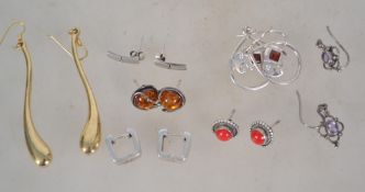 A good group of 6 pairs of sterling silver 925 earrings to include a large gilt silver drop pair,