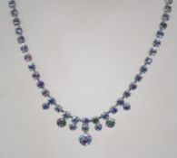 A vintage 1980s black and white rhinestone necklace in a silver tone setting with a bolt ring clasp.