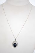 A sterling silver 925 rope twist necklace chain, having claw clasp and a silver locket pendant
