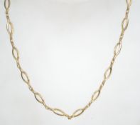 A Sarah Coventry vintage gold tone metal necklace chain, having bark effect spacers and a bolt