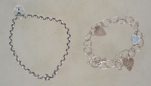 Two sterling silver 925 bracelet chains one having a heart padlock clasp and one having a toggle