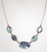 A silver belcher link necklace chain with bolt ring clasp, having silver and mother of pearl panels.