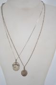 Two sterling silver 925 locket pendant necklaces both having foliate engraved lozenge shaped picture