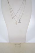 A group of four sterling silver 925 necklace chains one being a snake link chain with a silver and