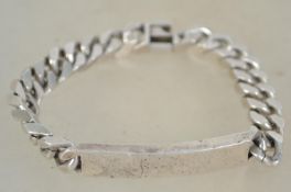 A sterling silver 925 heavy curb link bracelet chain with engraved panel and clip clasp. Weighs 46.7