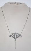 A contemporary Art Nouveau style necklace and earring set by Gl Nederlands Dutch Silver. Marked