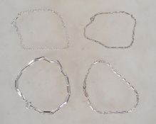 A group of sterling silver 925 bracelets one of rigid link form having a lobster claw clasp, one