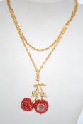 Suzanne Bjontegard Red Rhinestone Double Cherry Watch Pendant Necklace. Chain Measures 30 inches.