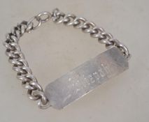 A hallmarked silver curb link belcher bracelet chain having a hallmarked silver name plaque