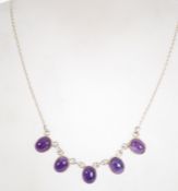 A sterling silver 925 belcher link necklace chain with claw clasp, having five purple amethyst stone