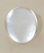 A sterling silver 925 signet ring having central mother of pearl panel. Weighs 13.6 grams size T.
