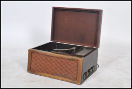 A vintage 1930's walnut cased radiogram with inset record deck and radio