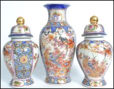 A collection of 3 Chinese vases each of different design and all being raised on socle plinth bases.