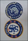 Two vintage style circular football plaques one for Chelsea Football Club and the other for