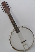 A 1920's Hawkes & Son open back banjolin - banjo mandolin musical instrument complete with the case.