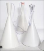 A set of three vintage retro style waisted pendant conical pendant ceiling lights after a Tom