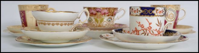 A collection of 5 19th century ceramic trio's to include a 19th century Crown Derby Imari pattern