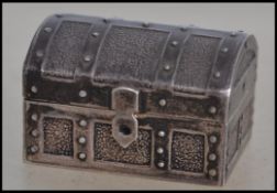 A silver vesta case in the form of a Spanish Armada treasure chest with hinged dome top. London