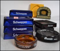 Breweriana A collection of vintage and retro advertising ashtrays to include Schweppes, Pony,