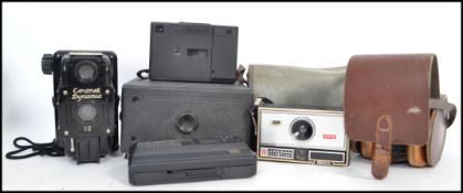 A collection of vintage cameras to include a Zenit