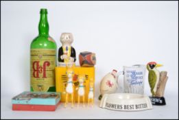 A good collection of vintage pub breweriana advertising point of sale items to include Babycham